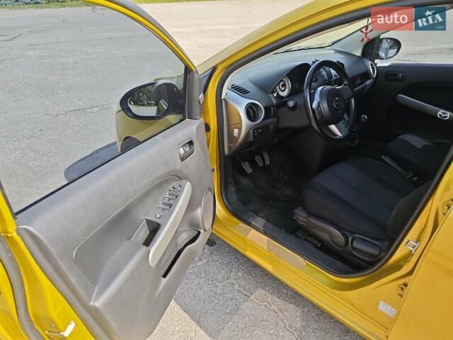 Жовтий Мазда 2, об'ємом двигуна 1.5 л та пробігом 74 тис. км за 5600 $, фото 11 на Automoto.ua