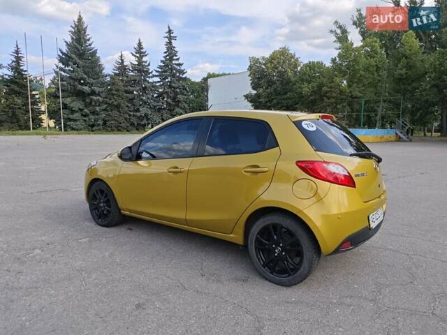 Жовтий Мазда 2, об'ємом двигуна 1.5 л та пробігом 74 тис. км за 5600 $, фото 4 на Automoto.ua