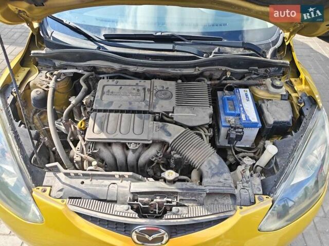 Жовтий Мазда 2, об'ємом двигуна 1.5 л та пробігом 74 тис. км за 5600 $, фото 20 на Automoto.ua