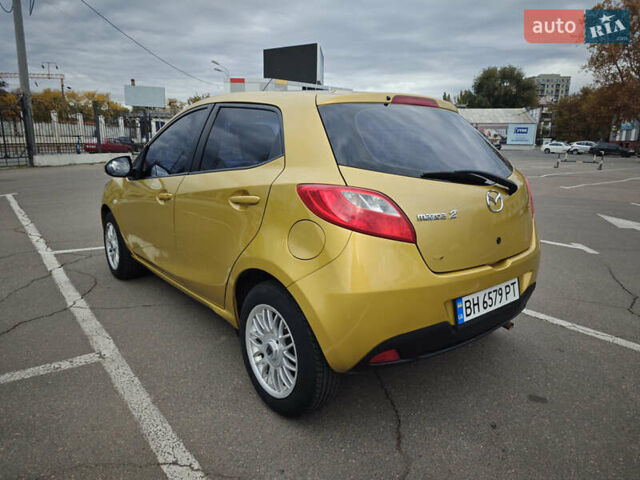 Жовтий Мазда 2, об'ємом двигуна 1.5 л та пробігом 103 тис. км за 6200 $, фото 1 на Automoto.ua