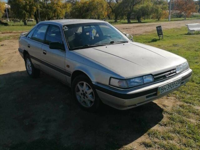 Серый Мазда 2, объемом двигателя 2 л и пробегом 469 тыс. км за 1200 $, фото 2 на Automoto.ua