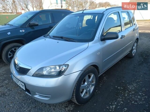 Сірий Мазда 2, об'ємом двигуна 1.39 л та пробігом 226 тис. км за 3300 $, фото 2 на Automoto.ua
