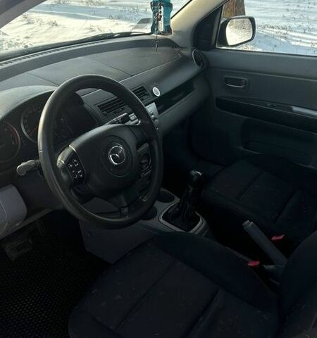 Серый Мазда 2, объемом двигателя 1.39 л и пробегом 150 тыс. км за 3400 $, фото 2 на Automoto.ua