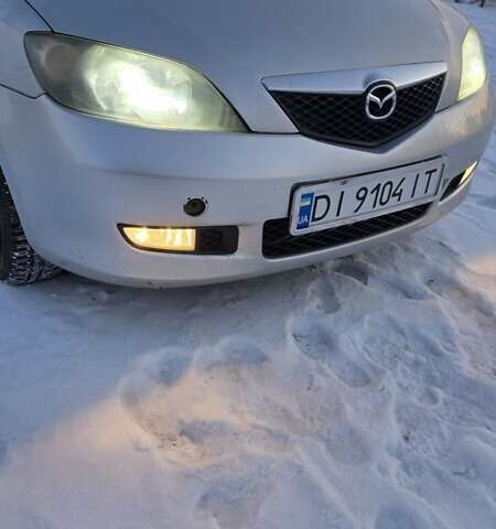 Сірий Мазда 2, об'ємом двигуна 1.4 л та пробігом 324 тис. км за 3500 $, фото 17 на Automoto.ua