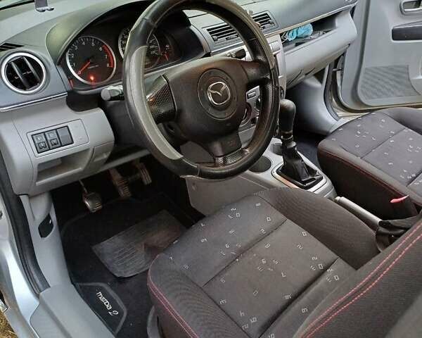 Серый Мазда 2, объемом двигателя 1.2 л и пробегом 185 тыс. км за 3530 $, фото 5 на Automoto.ua