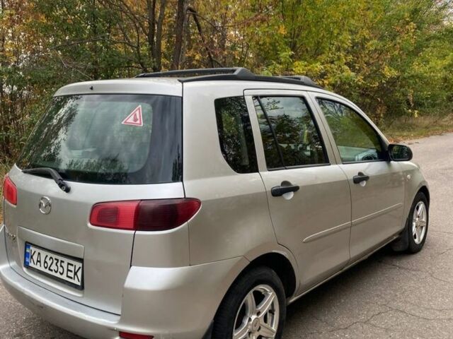 Серый Мазда 2, объемом двигателя 1.4 л и пробегом 248 тыс. км за 3499 $, фото 3 на Automoto.ua