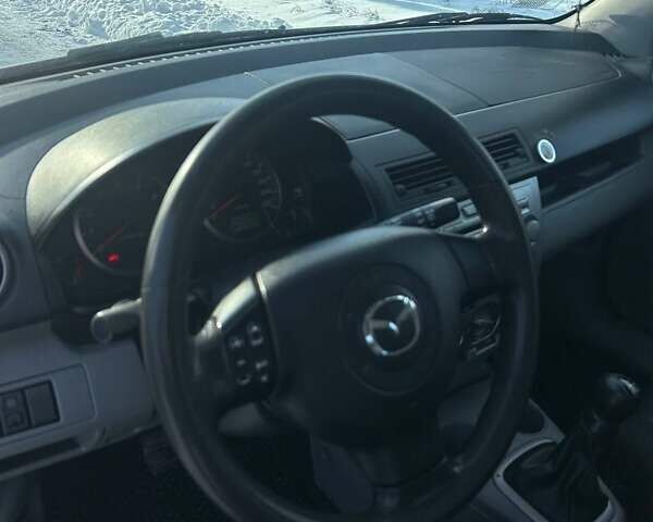 Серый Мазда 2, объемом двигателя 1.39 л и пробегом 150 тыс. км за 3500 $, фото 2 на Automoto.ua