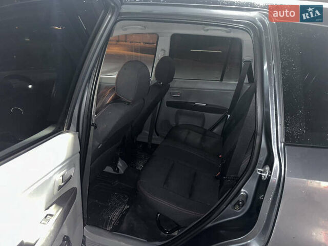 Сірий Мазда 2, об'ємом двигуна 1.4 л та пробігом 260 тис. км за 3900 $, фото 6 на Automoto.ua