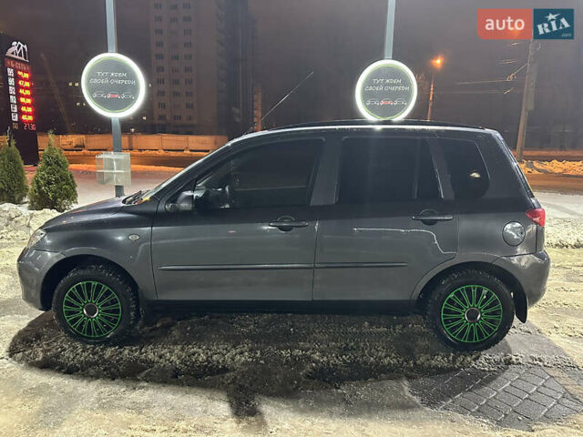 Сірий Мазда 2, об'ємом двигуна 1.4 л та пробігом 260 тис. км за 3900 $, фото 2 на Automoto.ua