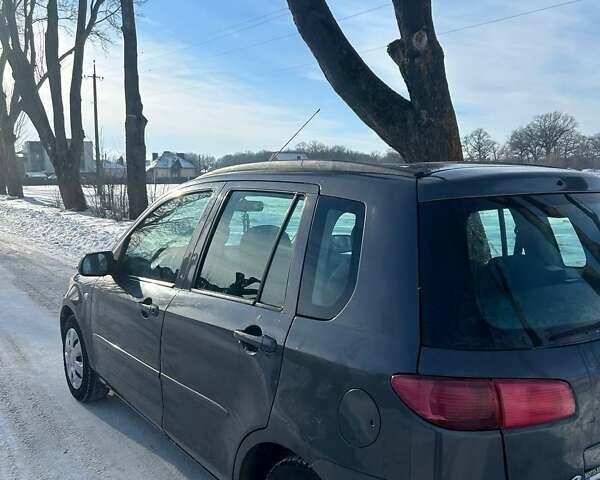 Сірий Мазда 2, об'ємом двигуна 1.39 л та пробігом 150 тис. км за 3400 $, фото 1 на Automoto.ua