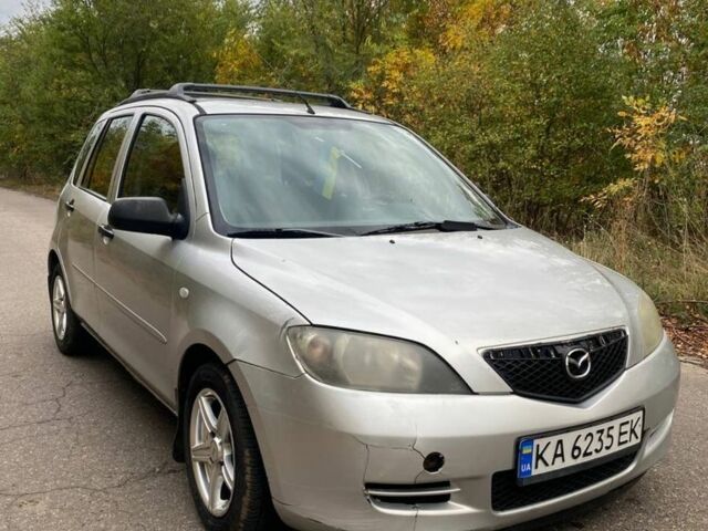Серый Мазда 2, объемом двигателя 1.4 л и пробегом 248 тыс. км за 3499 $, фото 1 на Automoto.ua