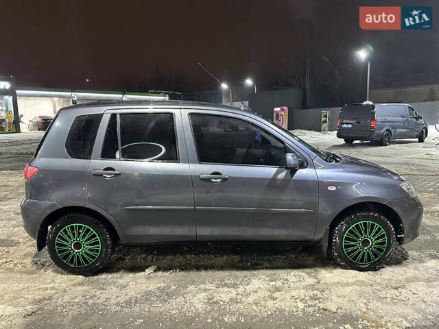 Сірий Мазда 2, об'ємом двигуна 1.4 л та пробігом 260 тис. км за 3900 $, фото 1 на Automoto.ua