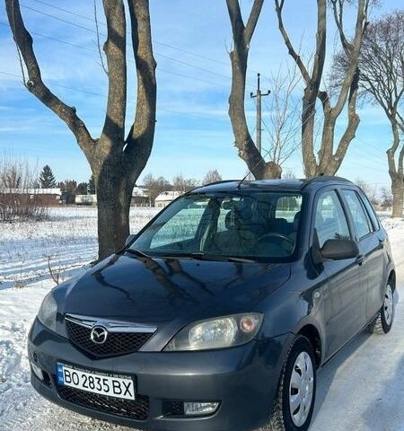 Серый Мазда 2, объемом двигателя 1.39 л и пробегом 150 тыс. км за 3400 $, фото 1 на Automoto.ua