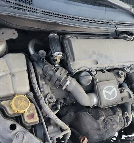Сірий Мазда 2, об'ємом двигуна 1.4 л та пробігом 324 тис. км за 3500 $, фото 19 на Automoto.ua