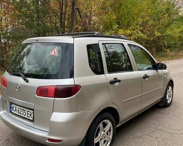 Серый Мазда 2, объемом двигателя 1.4 л и пробегом 248 тыс. км за 3499 $, фото 2 на Automoto.ua
