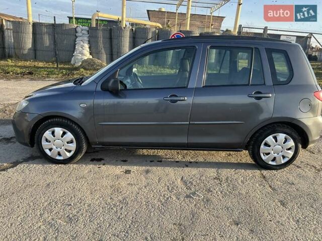 Серый Мазда 2, объемом двигателя 1.39 л и пробегом 120 тыс. км за 2999 $, фото 3 на Automoto.ua