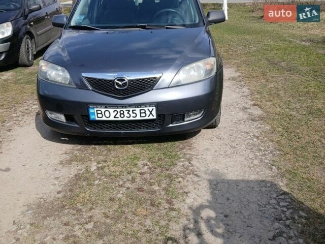 Сірий Мазда 2, об'ємом двигуна 1.39 л та пробігом 150 тис. км за 3300 $, фото 2 на Automoto.ua