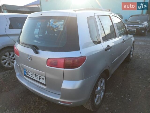 Сірий Мазда 2, об'ємом двигуна 1.39 л та пробігом 226 тис. км за 3300 $, фото 4 на Automoto.ua