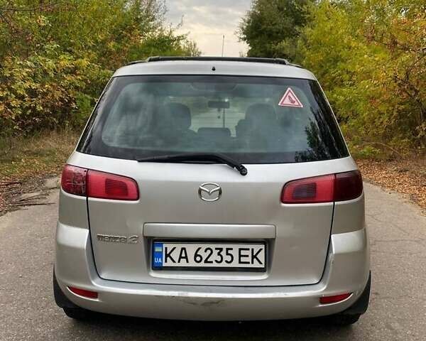 Серый Мазда 2, объемом двигателя 1.4 л и пробегом 248 тыс. км за 3499 $, фото 3 на Automoto.ua