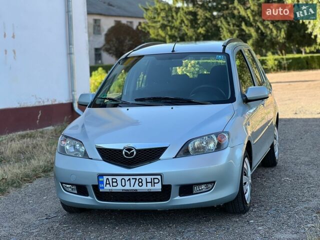 Серый Мазда 2, объемом двигателя 1.39 л и пробегом 265 тыс. км за 3500 $, фото 1 на Automoto.ua
