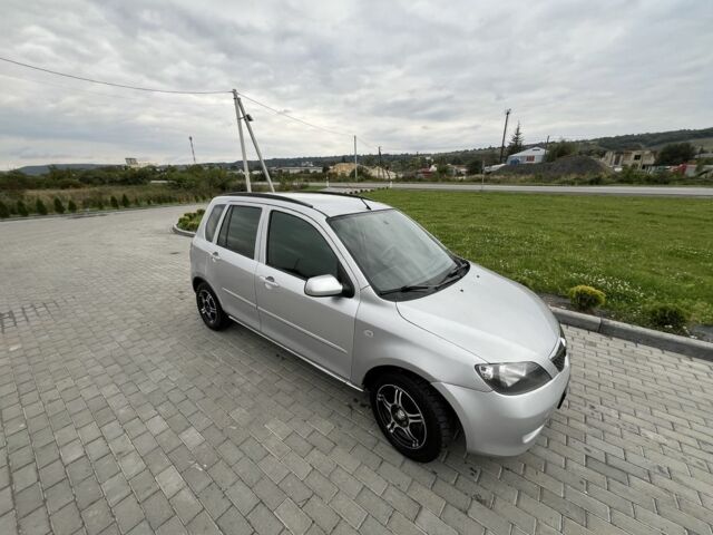 Серый Мазда 2, объемом двигателя 1.4 л и пробегом 322 тыс. км за 3700 $, фото 5 на Automoto.ua