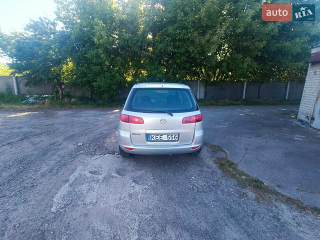 Сірий Мазда 2, об'ємом двигуна 1.4 л та пробігом 245 тис. км за 1399 $, фото 11 на Automoto.ua