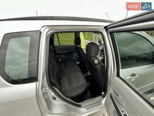 Серый Мазда 2, объемом двигателя 1.4 л и пробегом 322 тыс. км за 3700 $, фото 2 на Automoto.ua