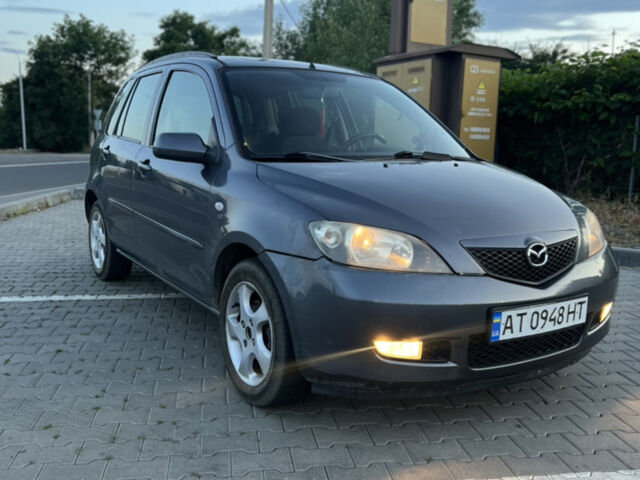 Сірий Мазда 2, об'ємом двигуна 1.39 л та пробігом 259 тис. км за 3750 $, фото 12 на Automoto.ua