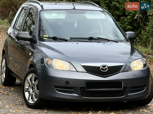 Серый Мазда 2, объемом двигателя 1.4 л и пробегом 247 тыс. км за 3350 $, фото 31 на Automoto.ua
