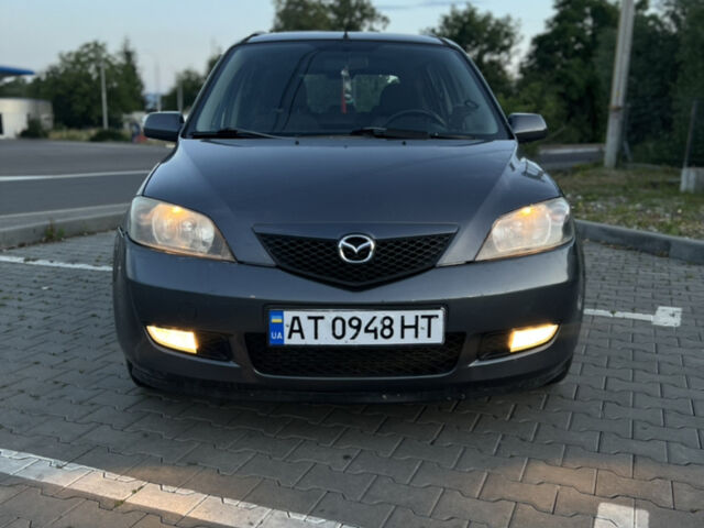 Сірий Мазда 2, об'ємом двигуна 1.39 л та пробігом 259 тис. км за 3750 $, фото 15 на Automoto.ua