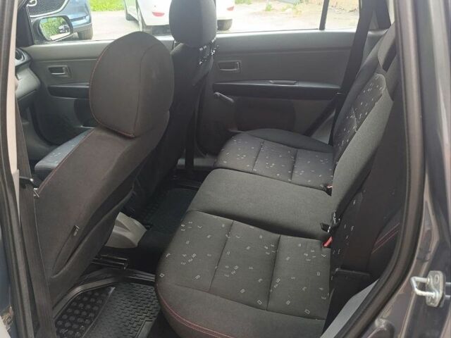 Сірий Мазда 2, об'ємом двигуна 1.4 л та пробігом 329 тис. км за 2500 $, фото 13 на Automoto.ua