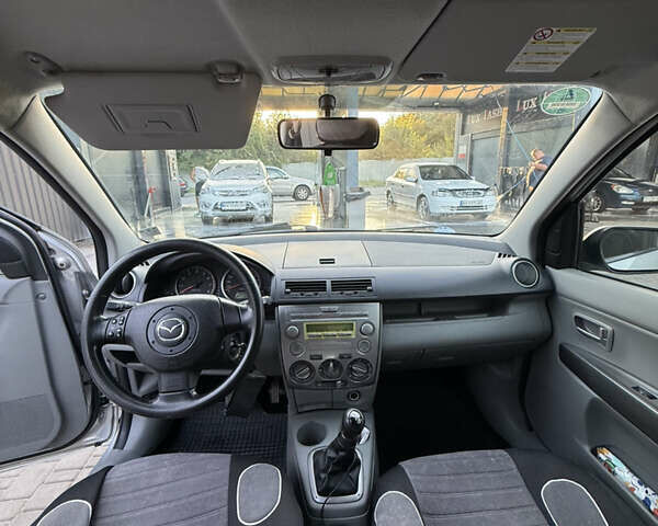 Серый Мазда 2, объемом двигателя 1.39 л и пробегом 126 тыс. км за 4700 $, фото 4 на Automoto.ua