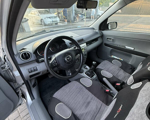 Серый Мазда 2, объемом двигателя 1.39 л и пробегом 126 тыс. км за 4700 $, фото 34 на Automoto.ua