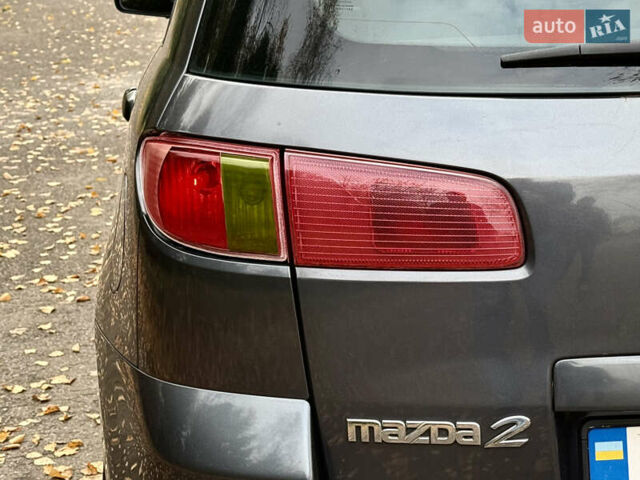 Серый Мазда 2, объемом двигателя 1.4 л и пробегом 247 тыс. км за 3350 $, фото 12 на Automoto.ua