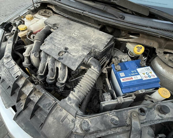 Серый Мазда 2, объемом двигателя 1.39 л и пробегом 126 тыс. км за 4700 $, фото 25 на Automoto.ua