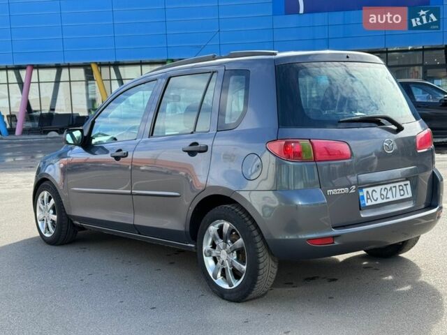 Сірий Мазда 2, об'ємом двигуна 1.4 л та пробігом 254 тис. км за 3350 $, фото 4 на Automoto.ua