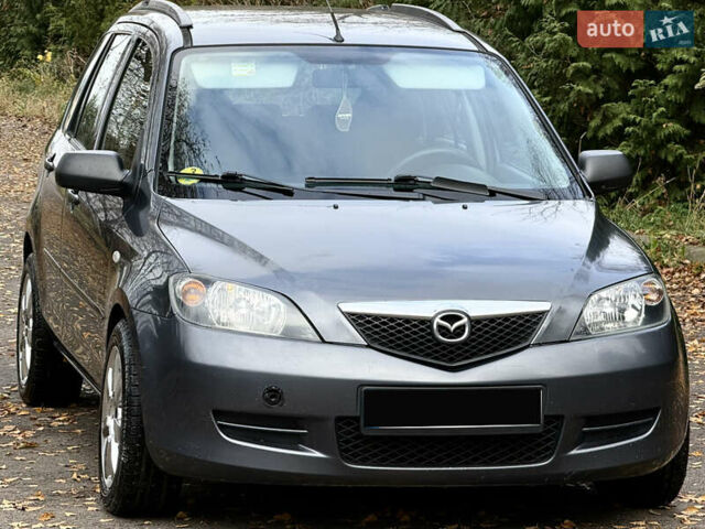 Серый Мазда 2, объемом двигателя 1.4 л и пробегом 247 тыс. км за 3350 $, фото 2 на Automoto.ua