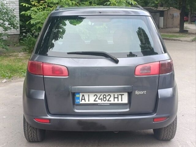 Сірий Мазда 2, об'ємом двигуна 1.4 л та пробігом 329 тис. км за 2500 $, фото 5 на Automoto.ua