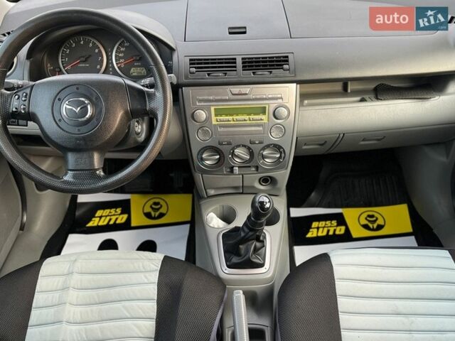 Серый Мазда 2, объемом двигателя 1.39 л и пробегом 130 тыс. км за 4300 $, фото 11 на Automoto.ua