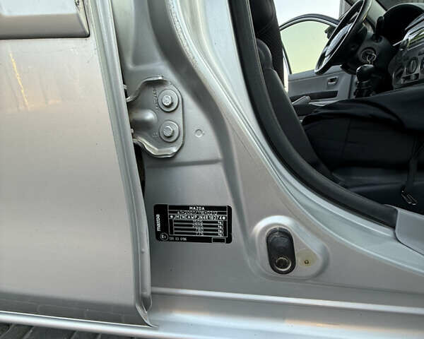 Серый Мазда 2, объемом двигателя 1.39 л и пробегом 126 тыс. км за 4700 $, фото 16 на Automoto.ua