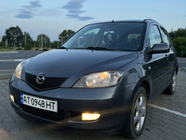 Сірий Мазда 2, об'ємом двигуна 1.39 л та пробігом 259 тис. км за 3750 $, фото 2 на Automoto.ua