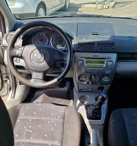 Сірий Мазда 2, об'ємом двигуна 1.4 л та пробігом 218 тис. км за 4900 $, фото 14 на Automoto.ua