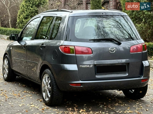 Серый Мазда 2, объемом двигателя 1.4 л и пробегом 247 тыс. км за 3350 $, фото 7 на Automoto.ua