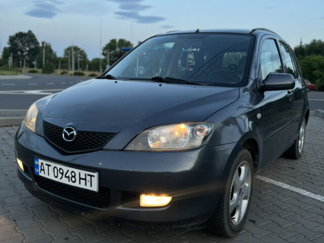 Сірий Мазда 2, об'ємом двигуна 1.39 л та пробігом 259 тис. км за 3750 $, фото 3 на Automoto.ua