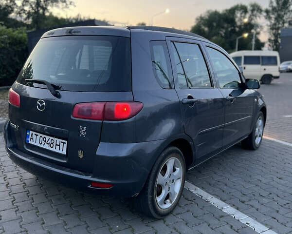 Серый Мазда 2, объемом двигателя 1.39 л и пробегом 220 тыс. км за 3750 $, фото 8 на Automoto.ua