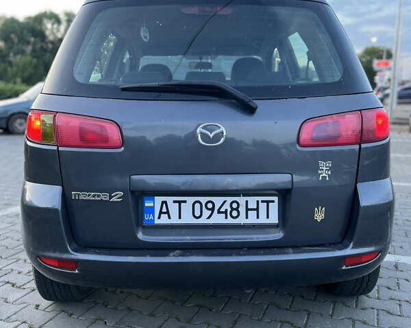 Серый Мазда 2, объемом двигателя 1.39 л и пробегом 220 тыс. км за 3750 $, фото 5 на Automoto.ua