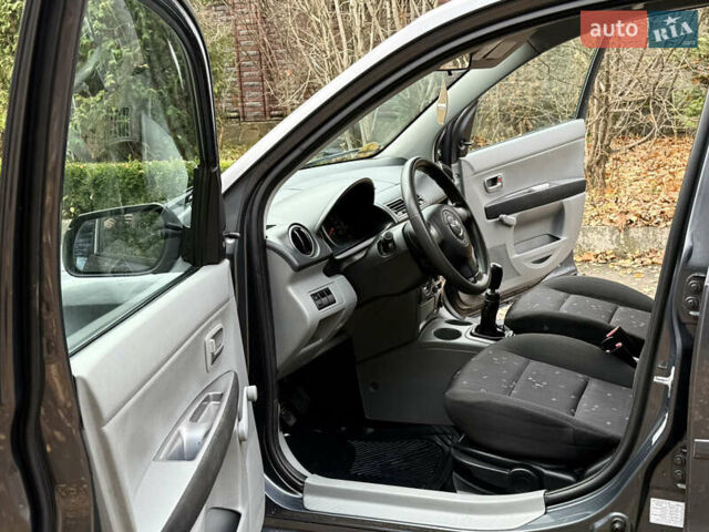 Серый Мазда 2, объемом двигателя 1.4 л и пробегом 247 тыс. км за 3350 $, фото 13 на Automoto.ua