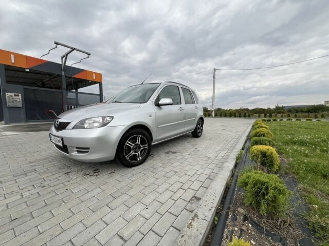 Серый Мазда 2, объемом двигателя 1.4 л и пробегом 322 тыс. км за 3700 $, фото 4 на Automoto.ua