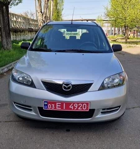 Сірий Мазда 2, об'ємом двигуна 1.4 л та пробігом 218 тис. км за 4900 $, фото 1 на Automoto.ua