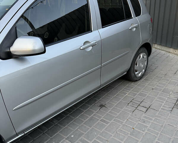 Серый Мазда 2, объемом двигателя 1.39 л и пробегом 126 тыс. км за 4700 $, фото 7 на Automoto.ua